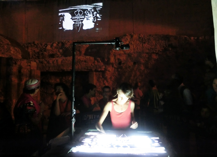 Description: Macintosh HD:Users:jbfisher 1:Desktop:summer2013travel:israel:small:nightlights_sandartist.jpg